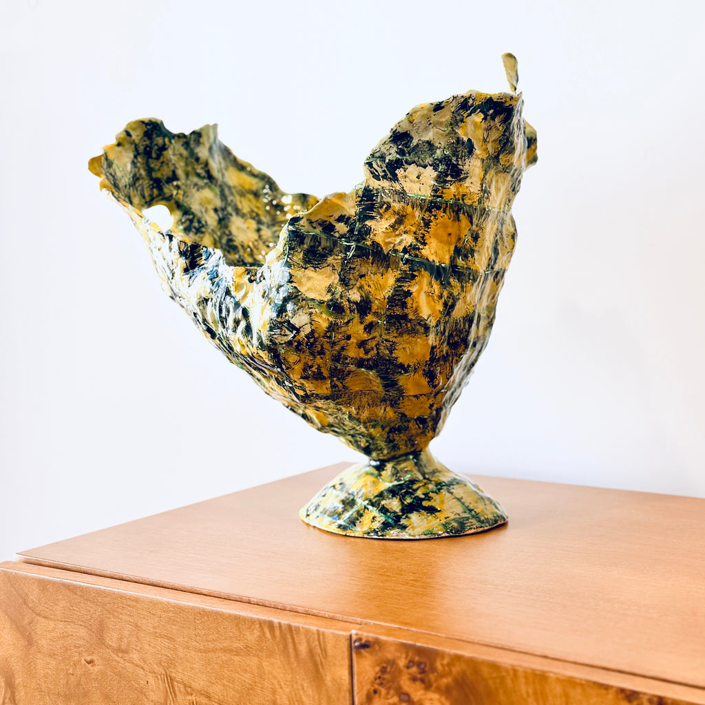 Yellow vase with diamond pattern