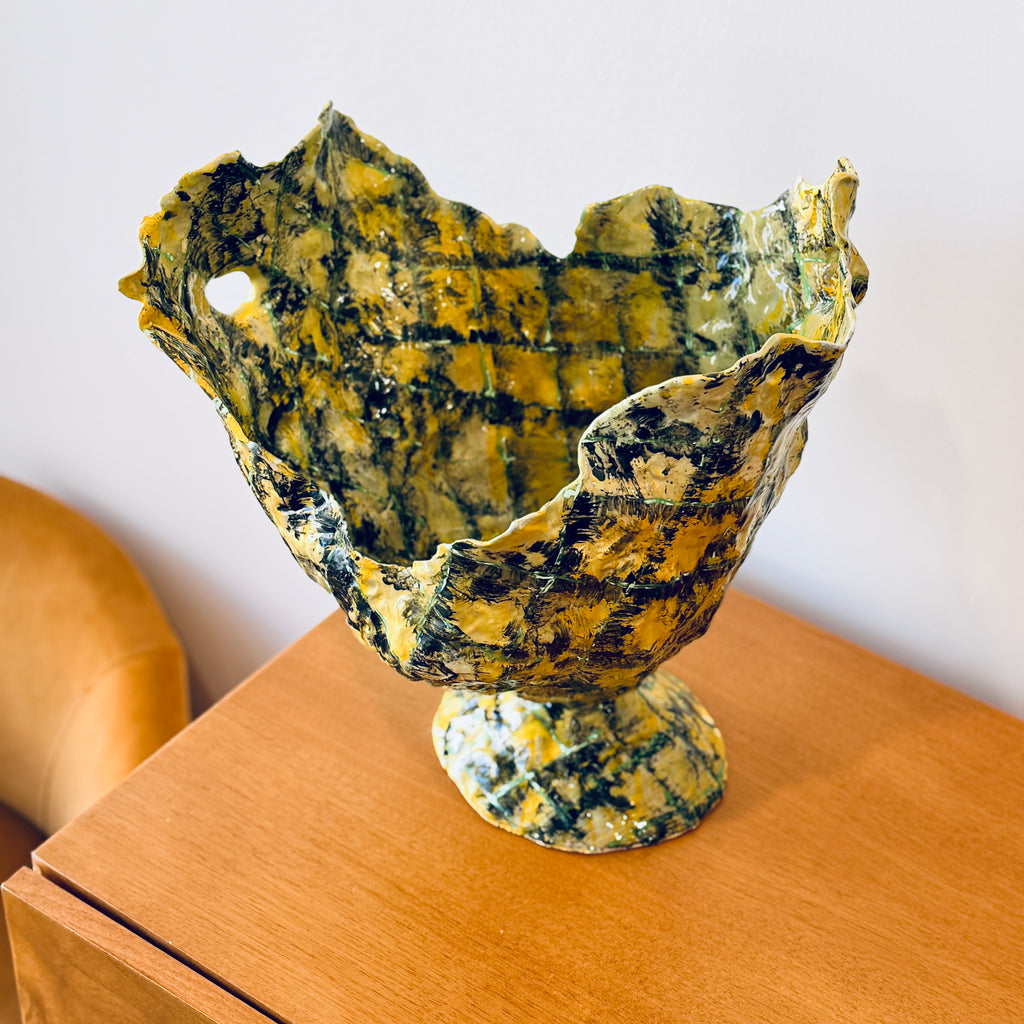 Yellow vase with diamond pattern