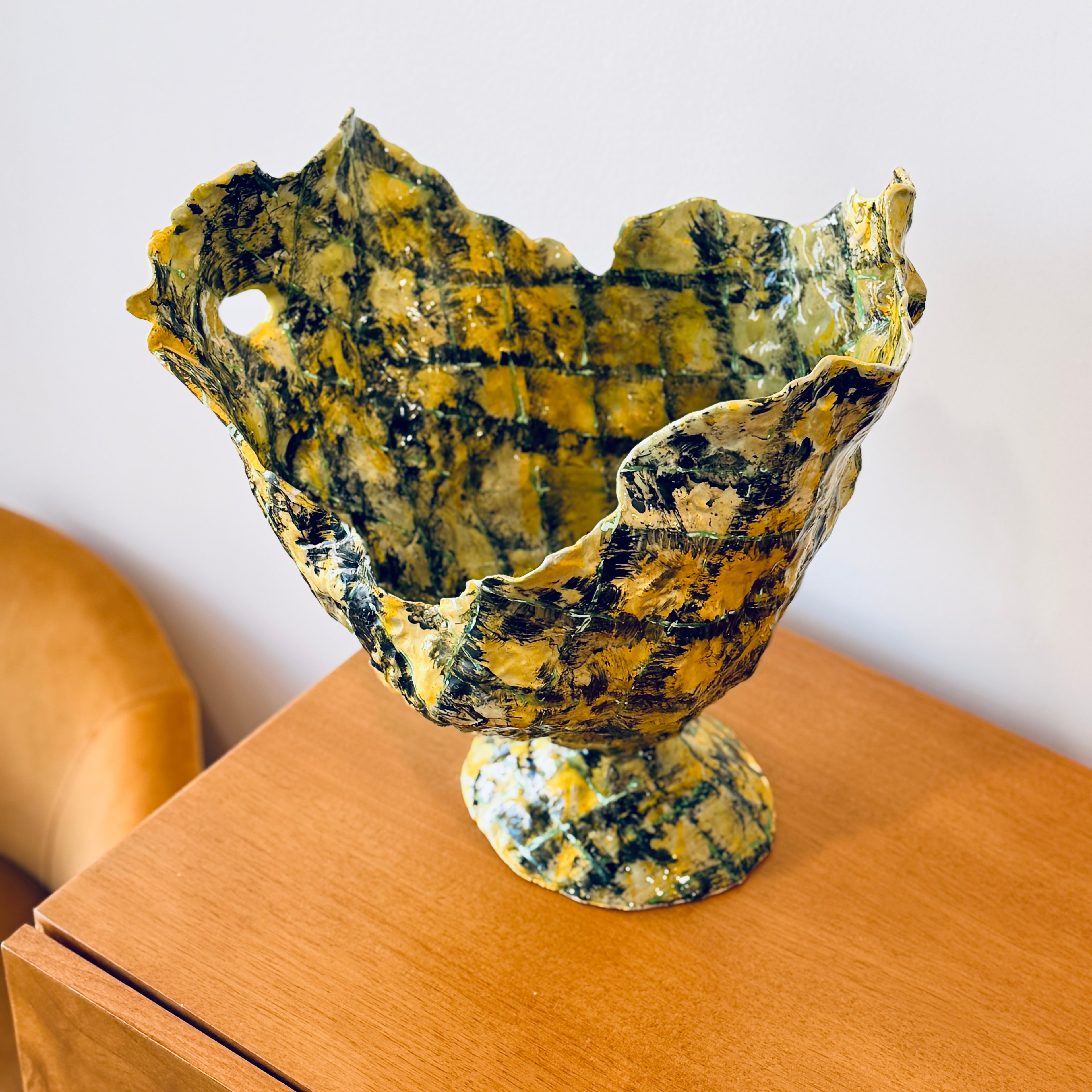 Yellow vase with diamond pattern