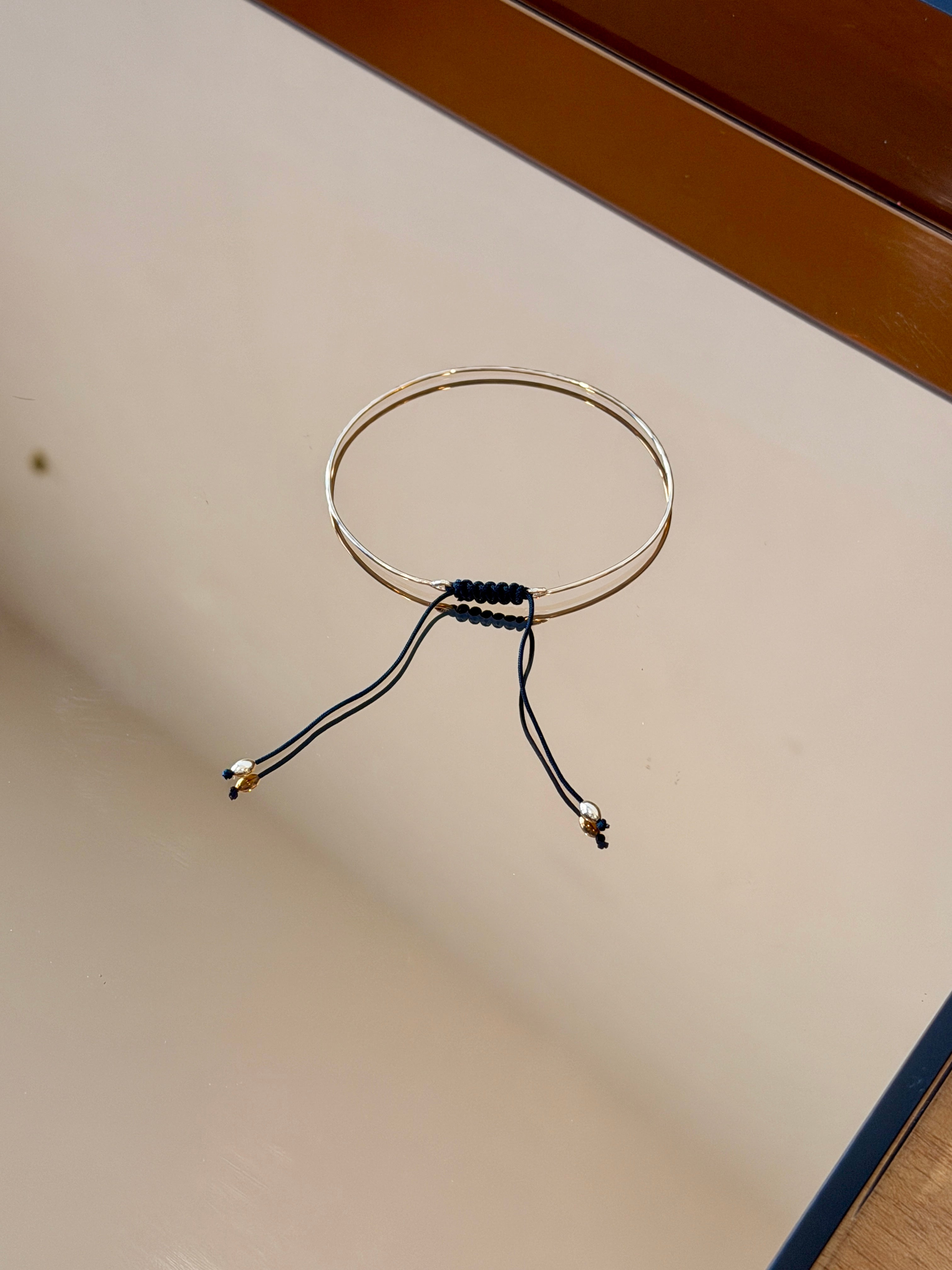 Thin Gold Bracelet with Knotted Accent