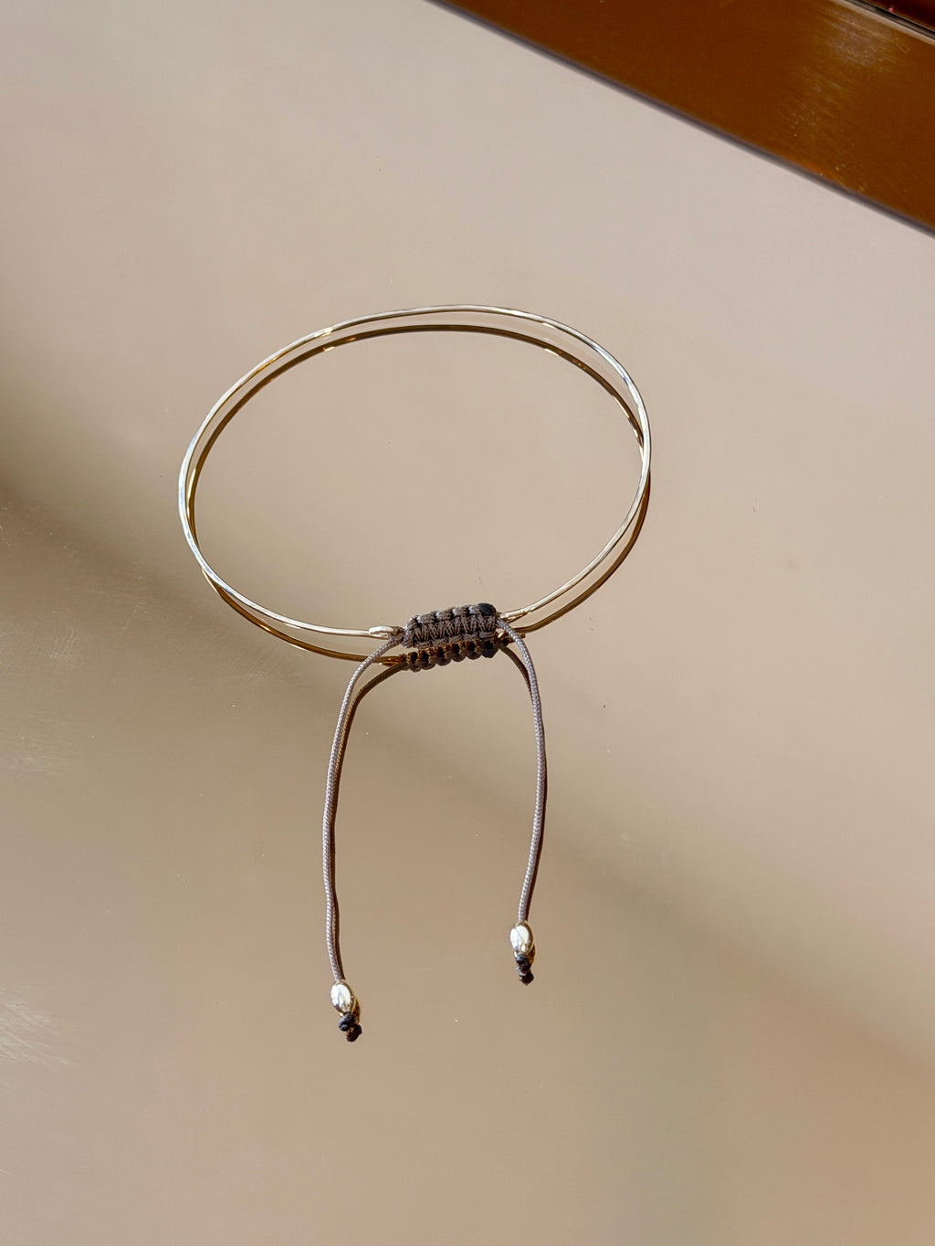 Thin Gold Bracelet with Knotted Accent