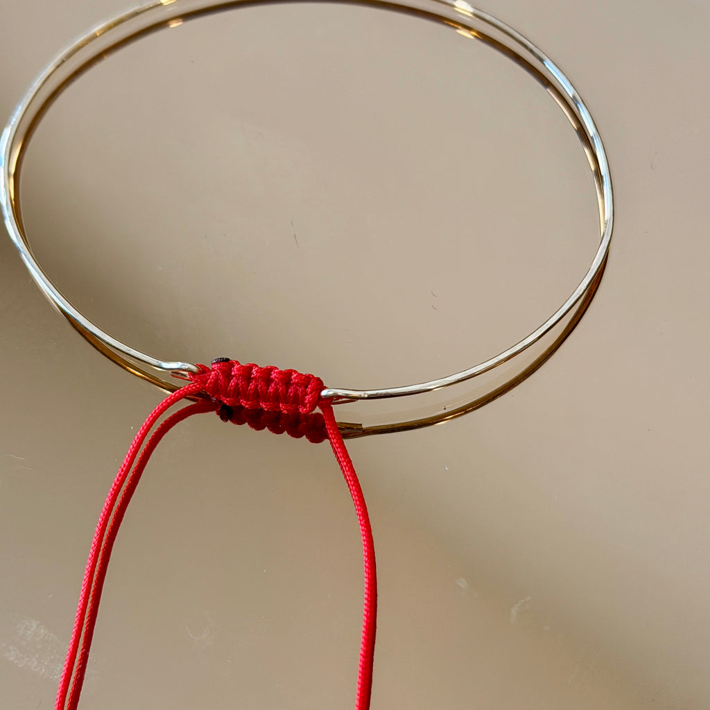 Thin Gold Bracelet with Knotted Accent