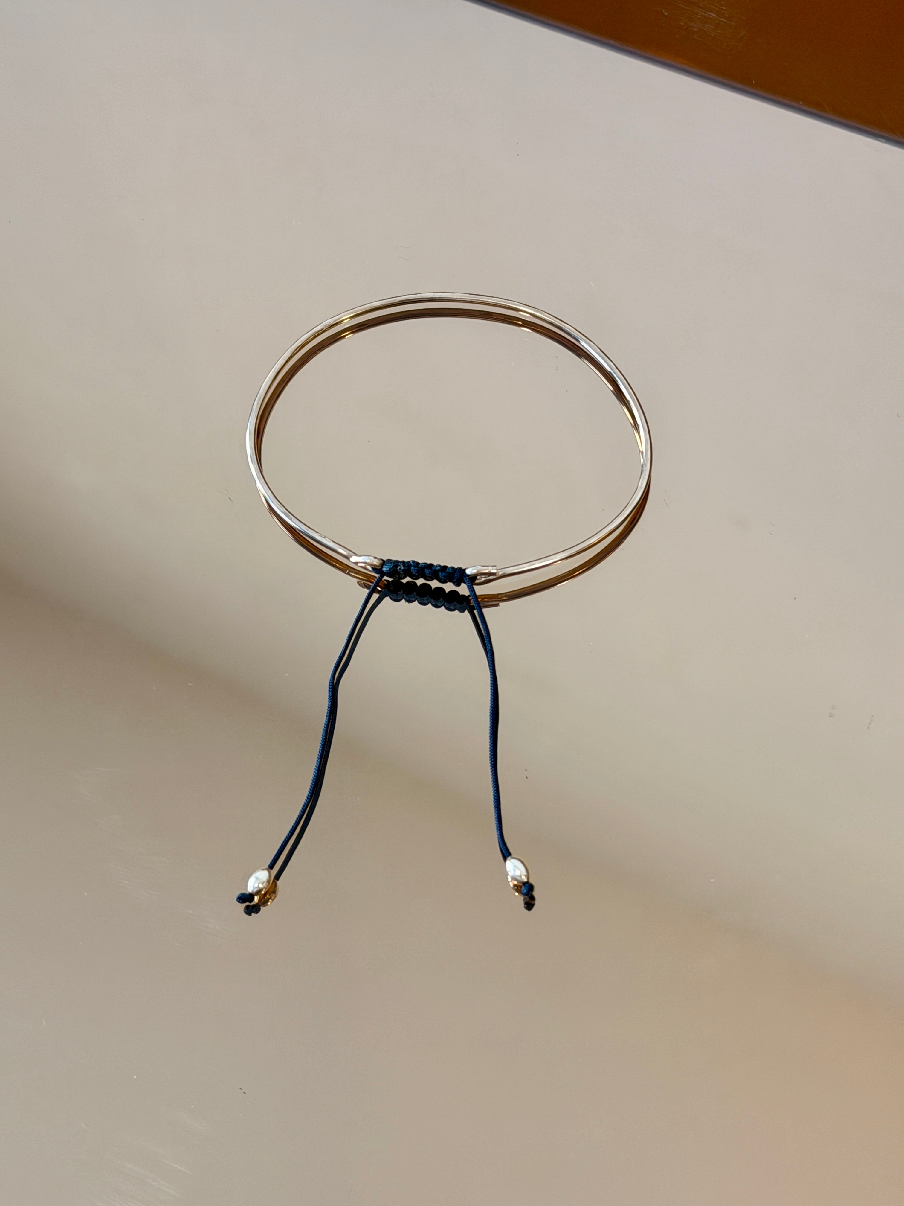 Thick Gold Bracelet with Knotted Accent