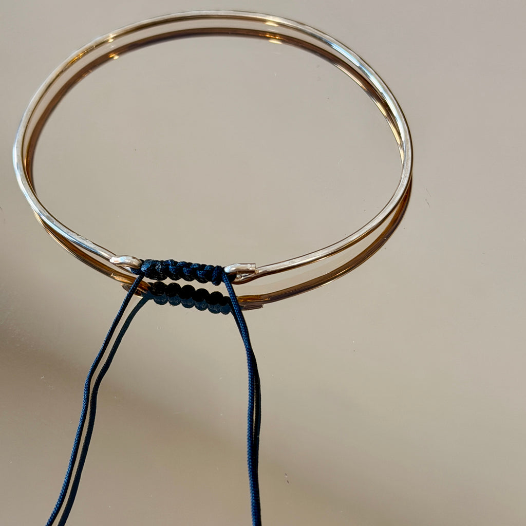 Thick Gold Bracelet with Knotted Accent