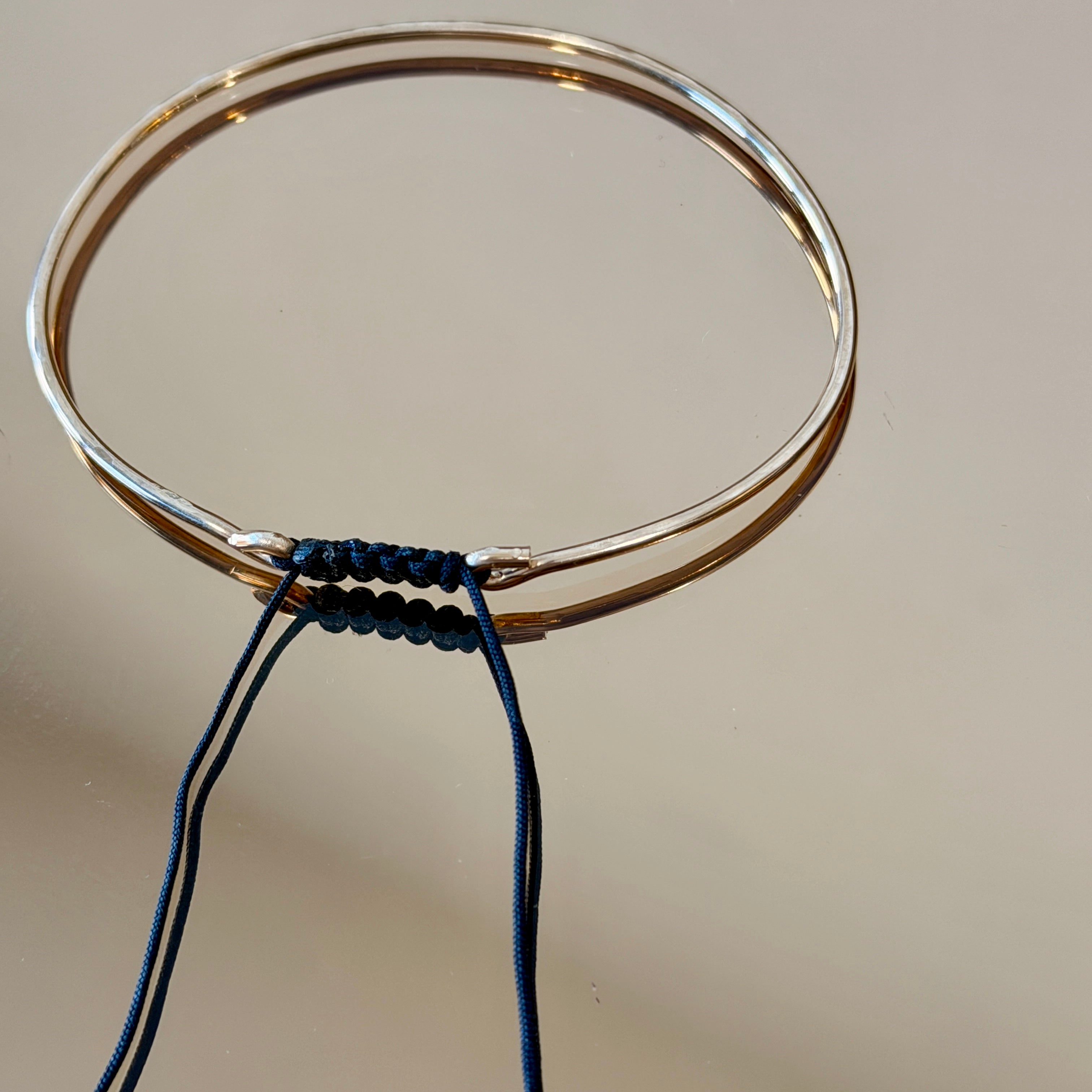 Thick Gold Bracelet with Knotted Accent