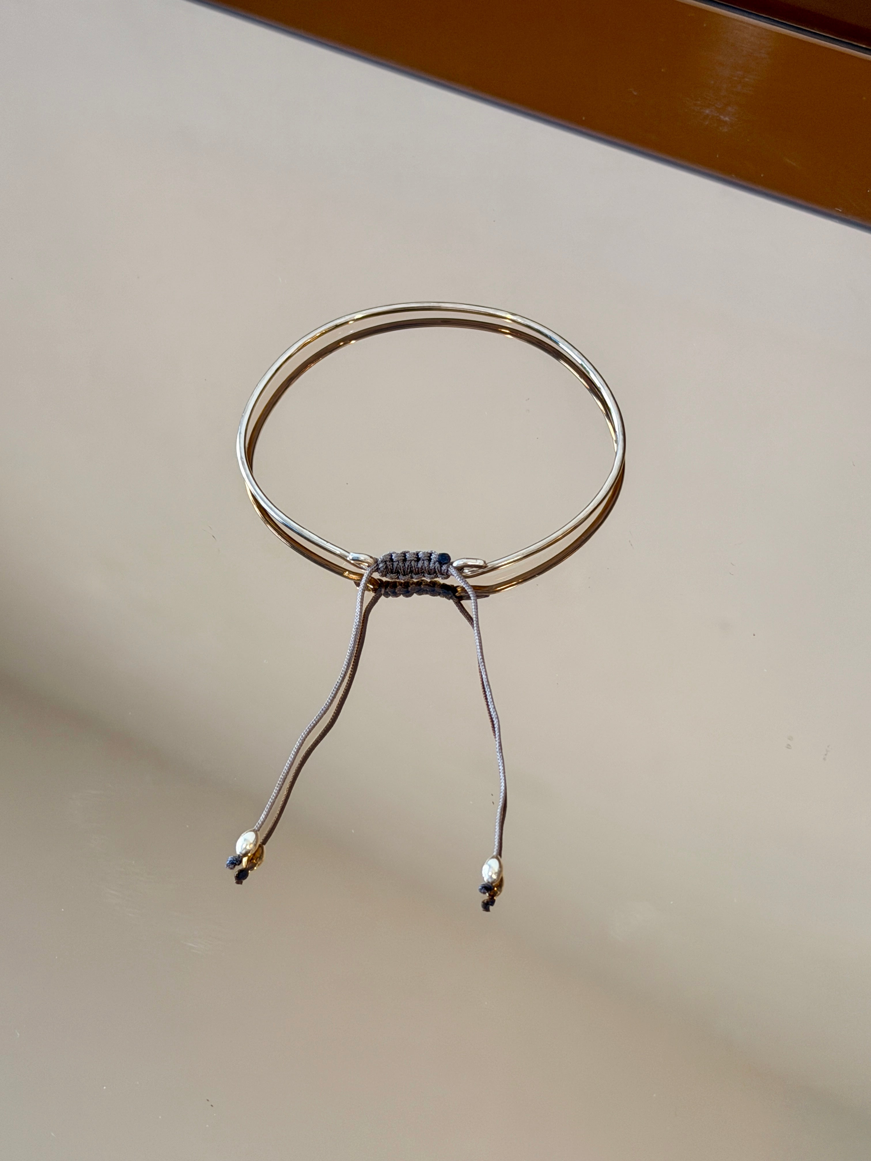 Thick Gold Bracelet with Knotted Accent