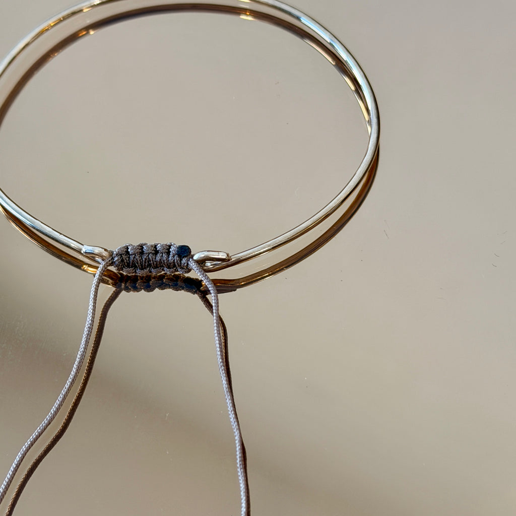 Thick Gold Bracelet with Knotted Accent