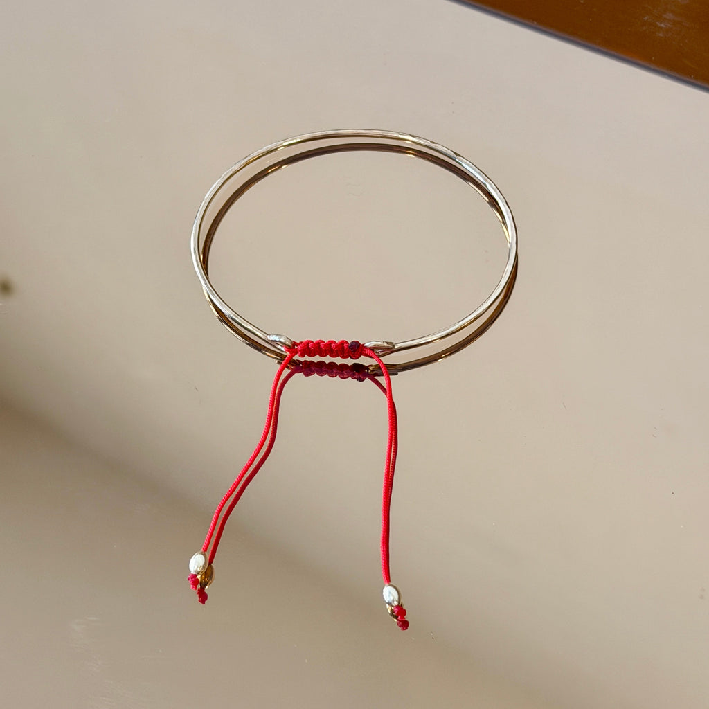 Thick Gold Bracelet with Knotted Accent