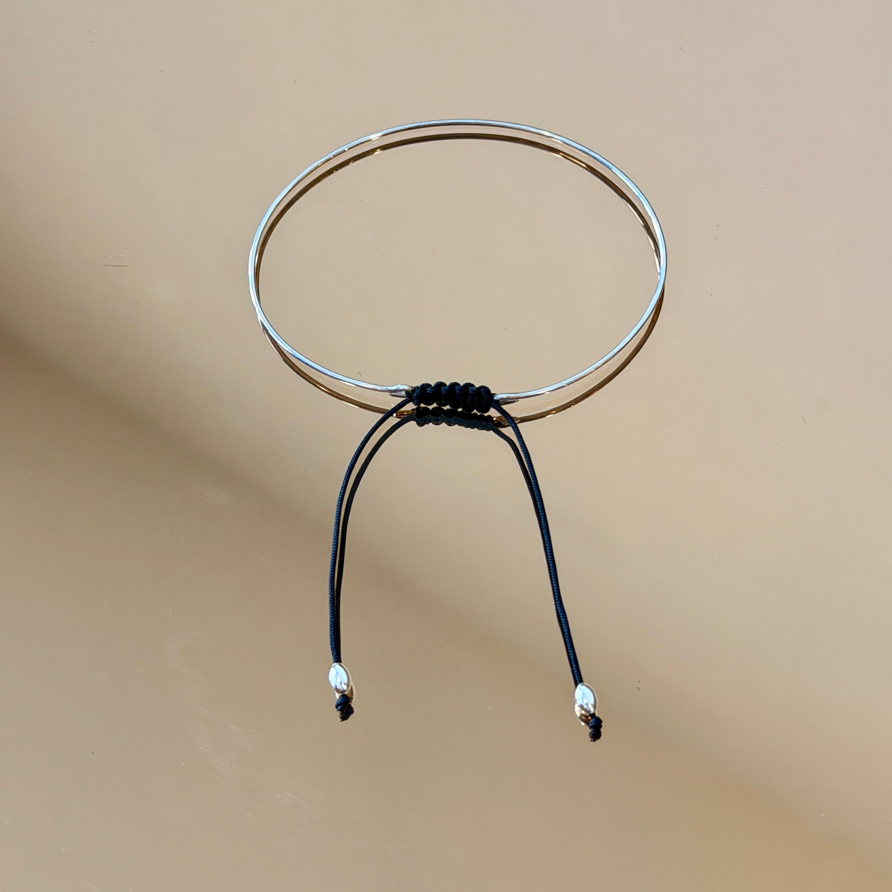 Thin Silver Bracelet with Knotted Accent