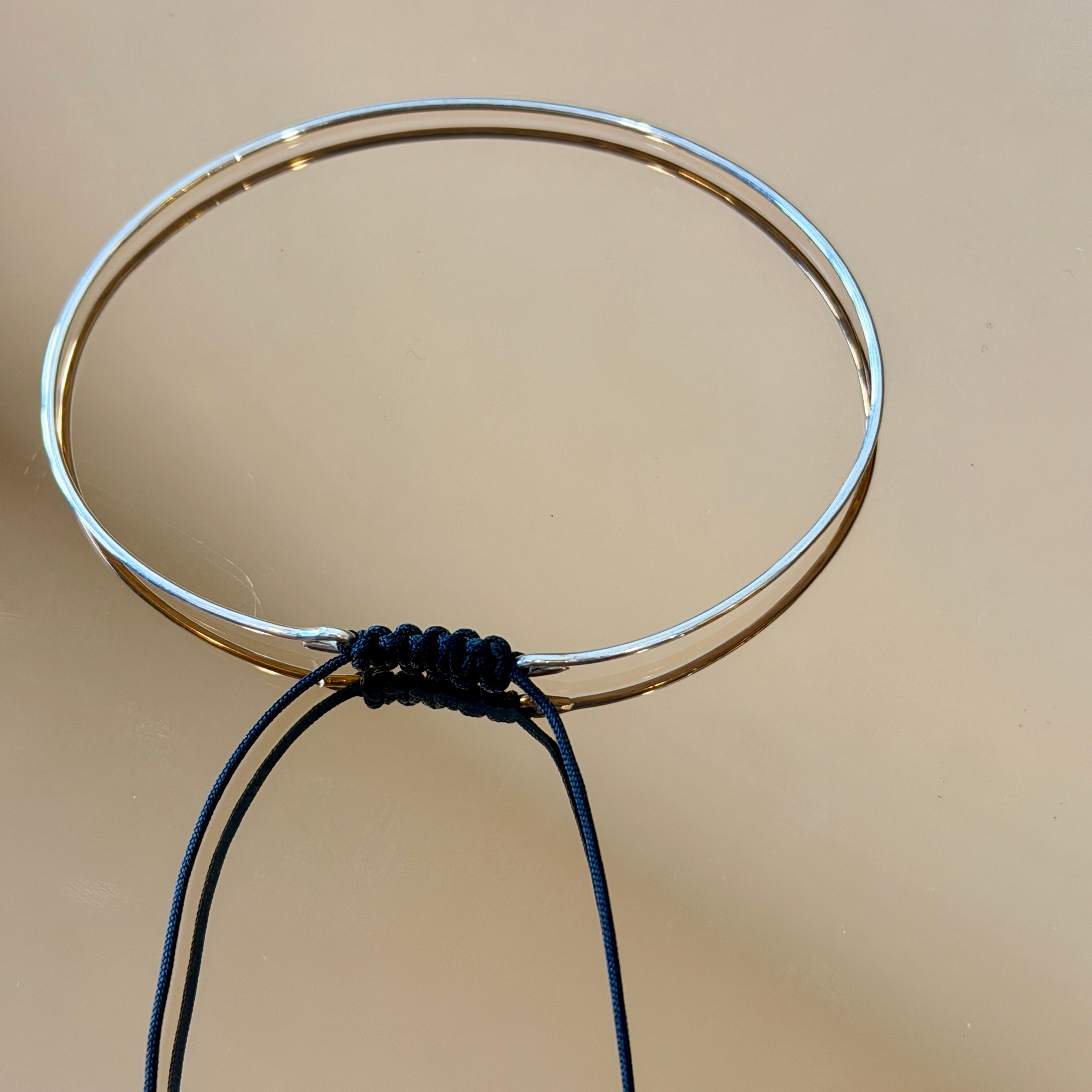 Thin Silver Bracelet with Knotted Accent