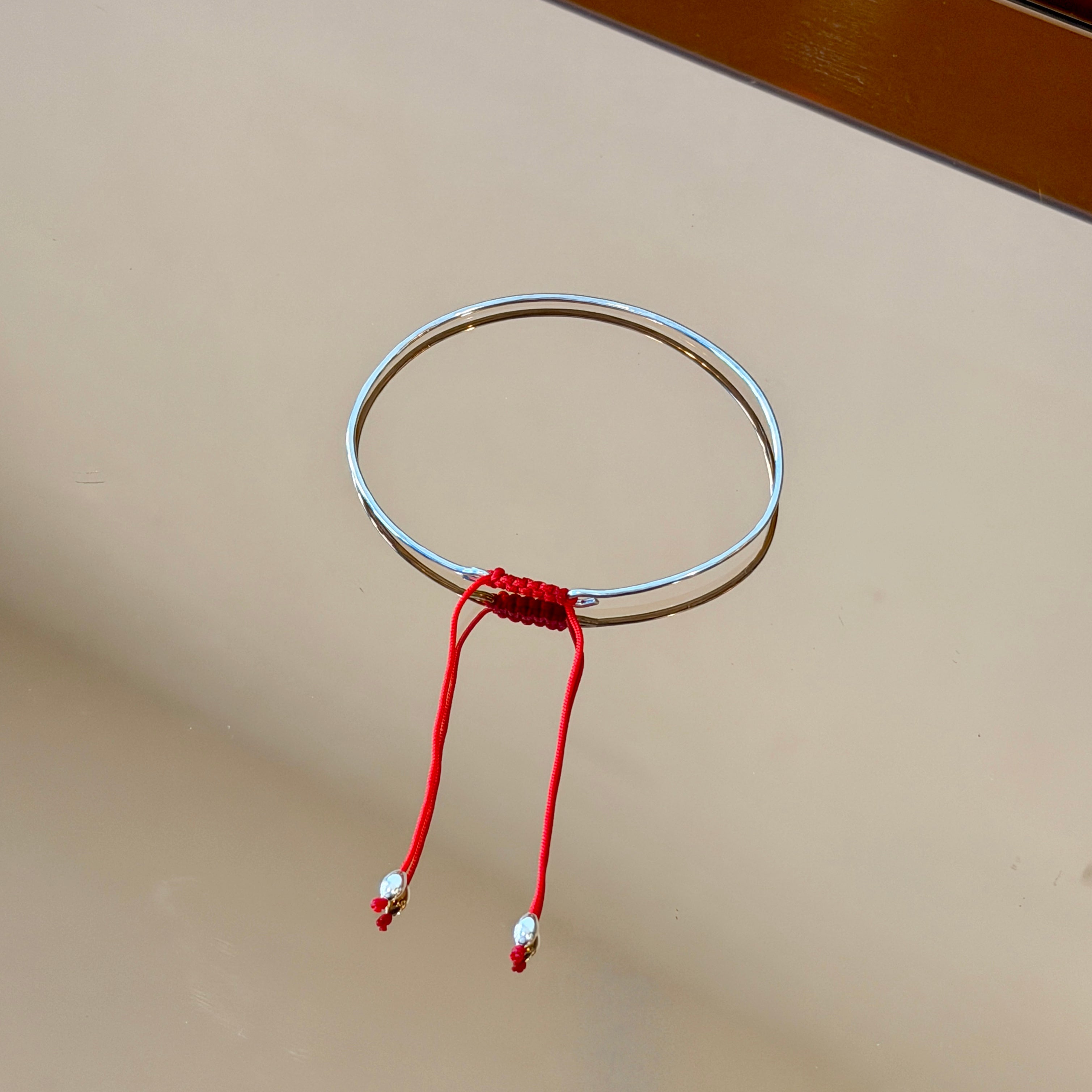 Medium Silver Bracelet with Knotted Accent