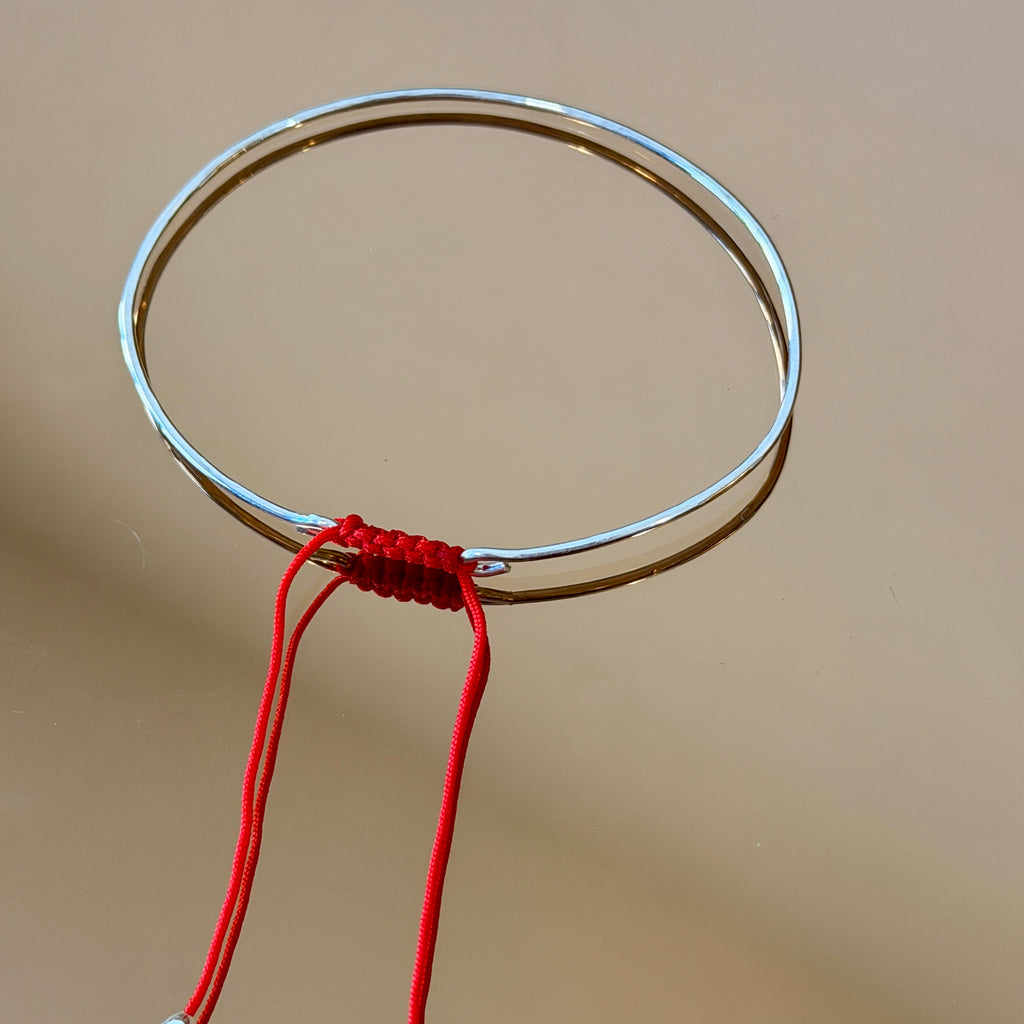 Medium Silver Bracelet with Knotted Accent