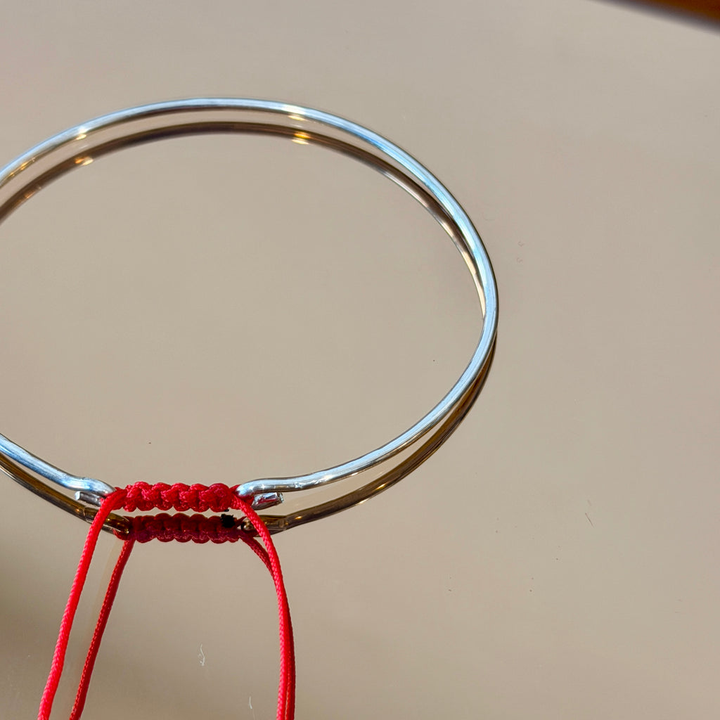 Thick Silver Bracelet with Knotted Accent