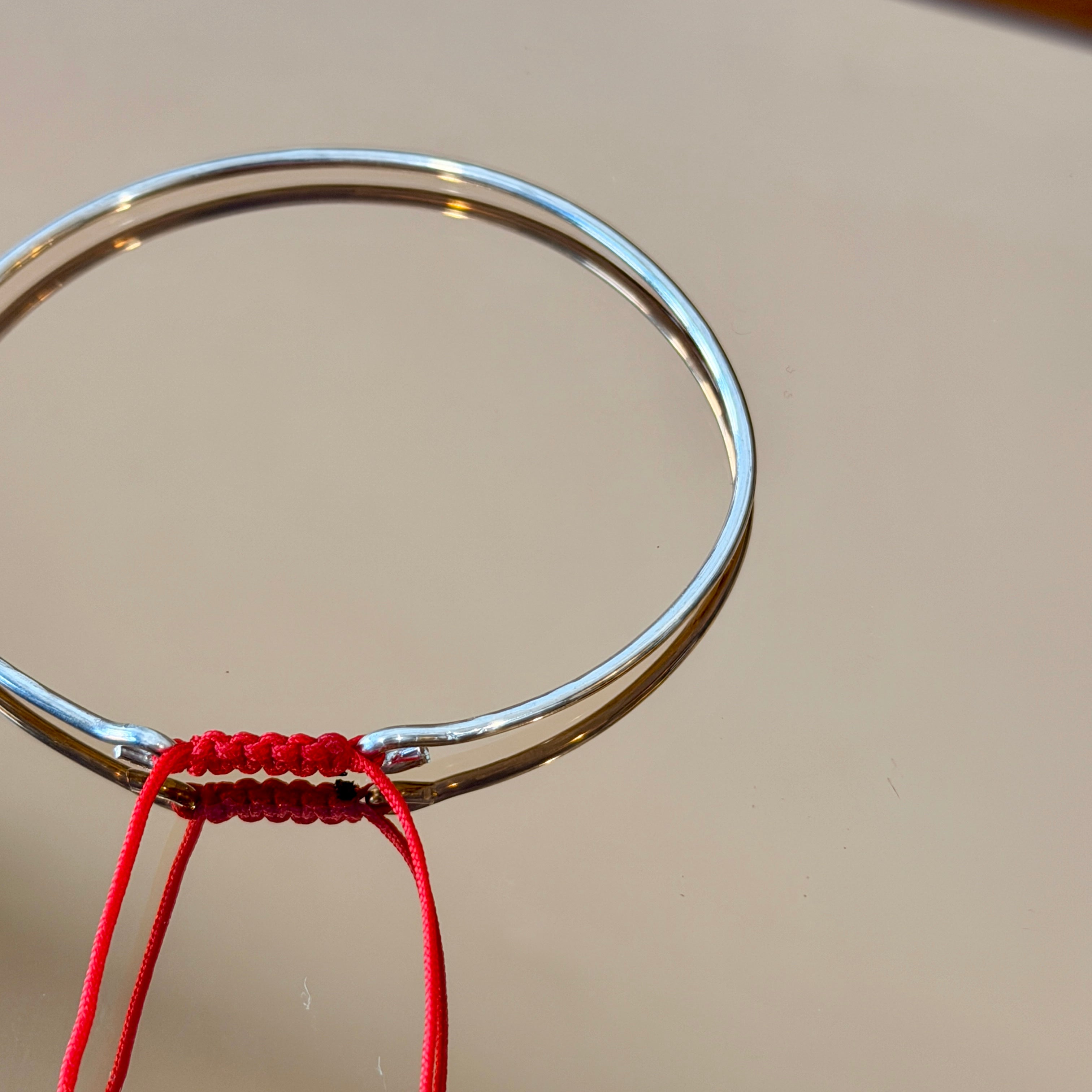 Thick Silver Bracelet with Knotted Accent