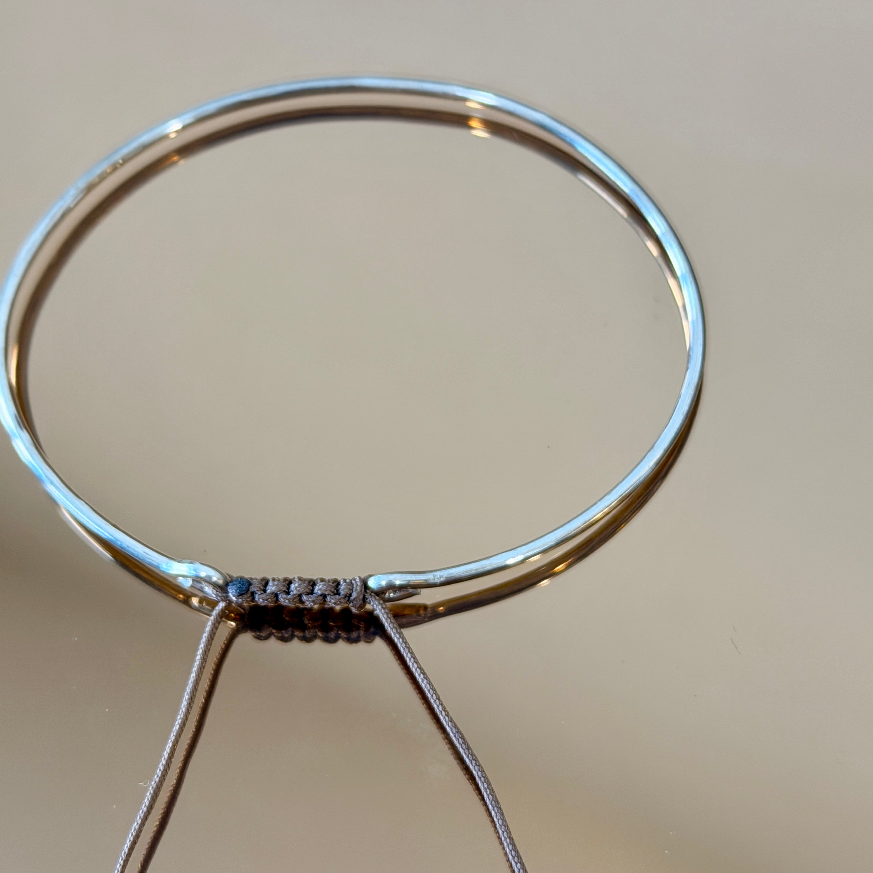 Thick Silver Bracelet with Knotted Accent