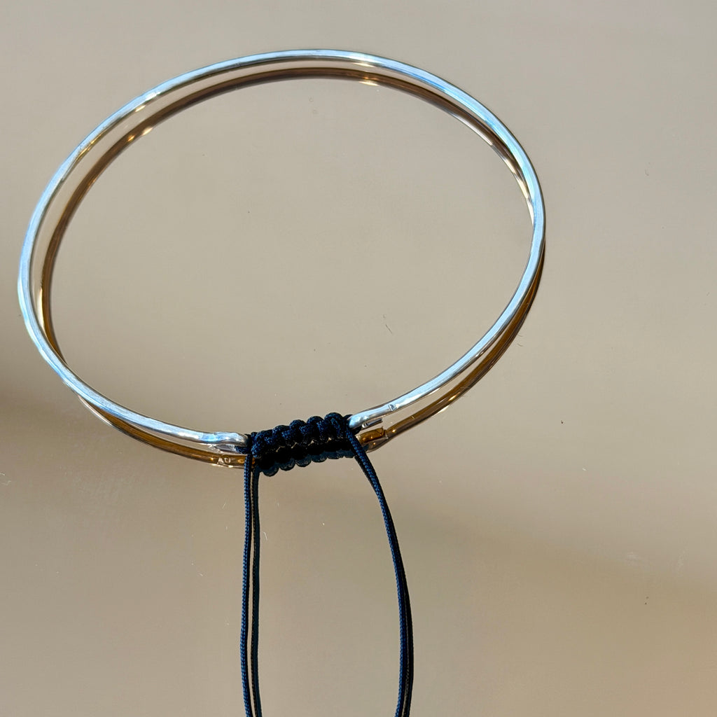 Thick Silver Bracelet with Knotted Accent