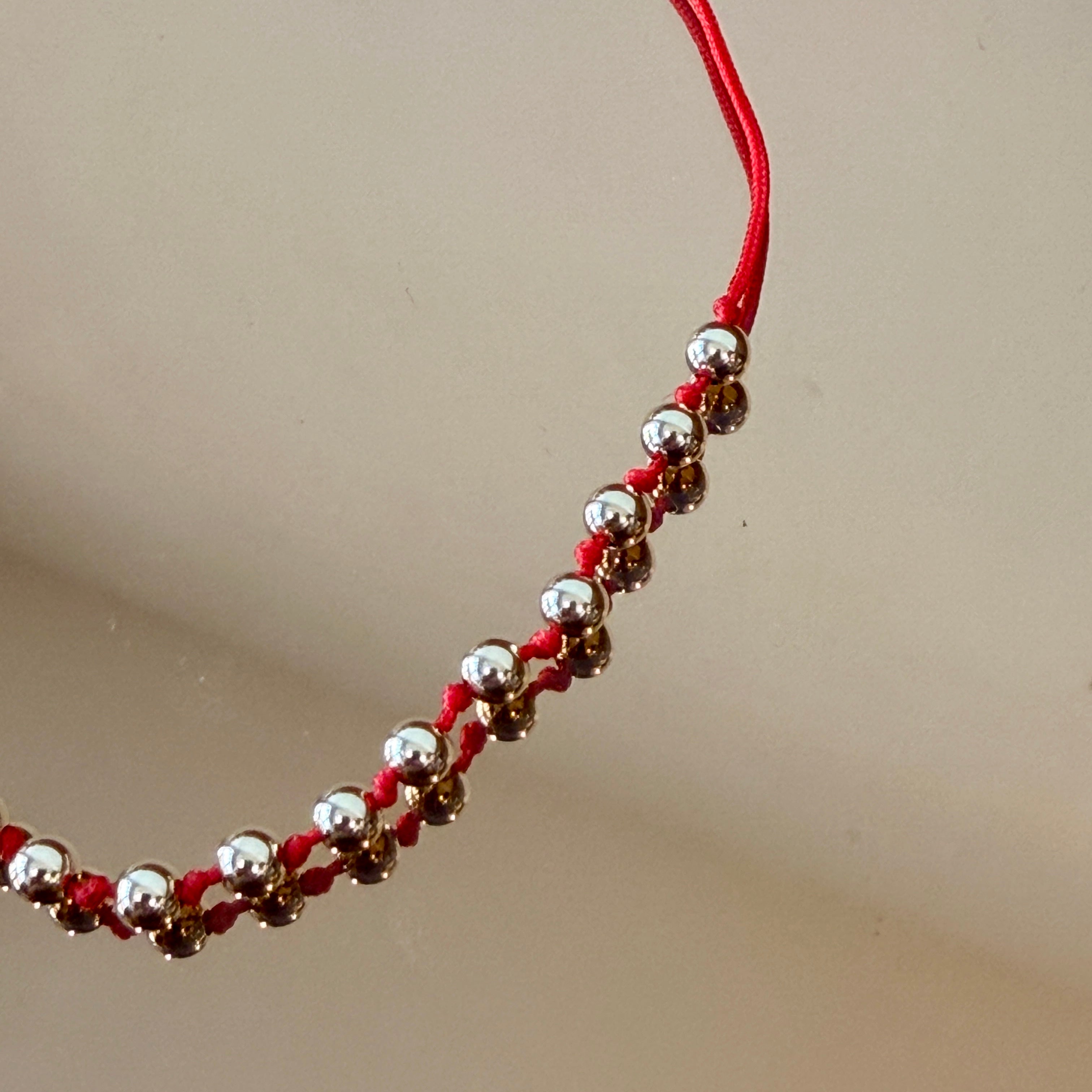 String Bracelet with Gold Accents