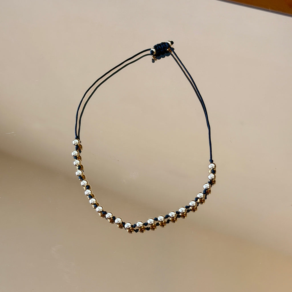 String Bracelet with Gold Accents