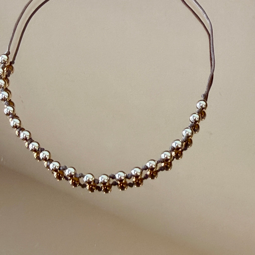 String Bracelet with Gold Accents