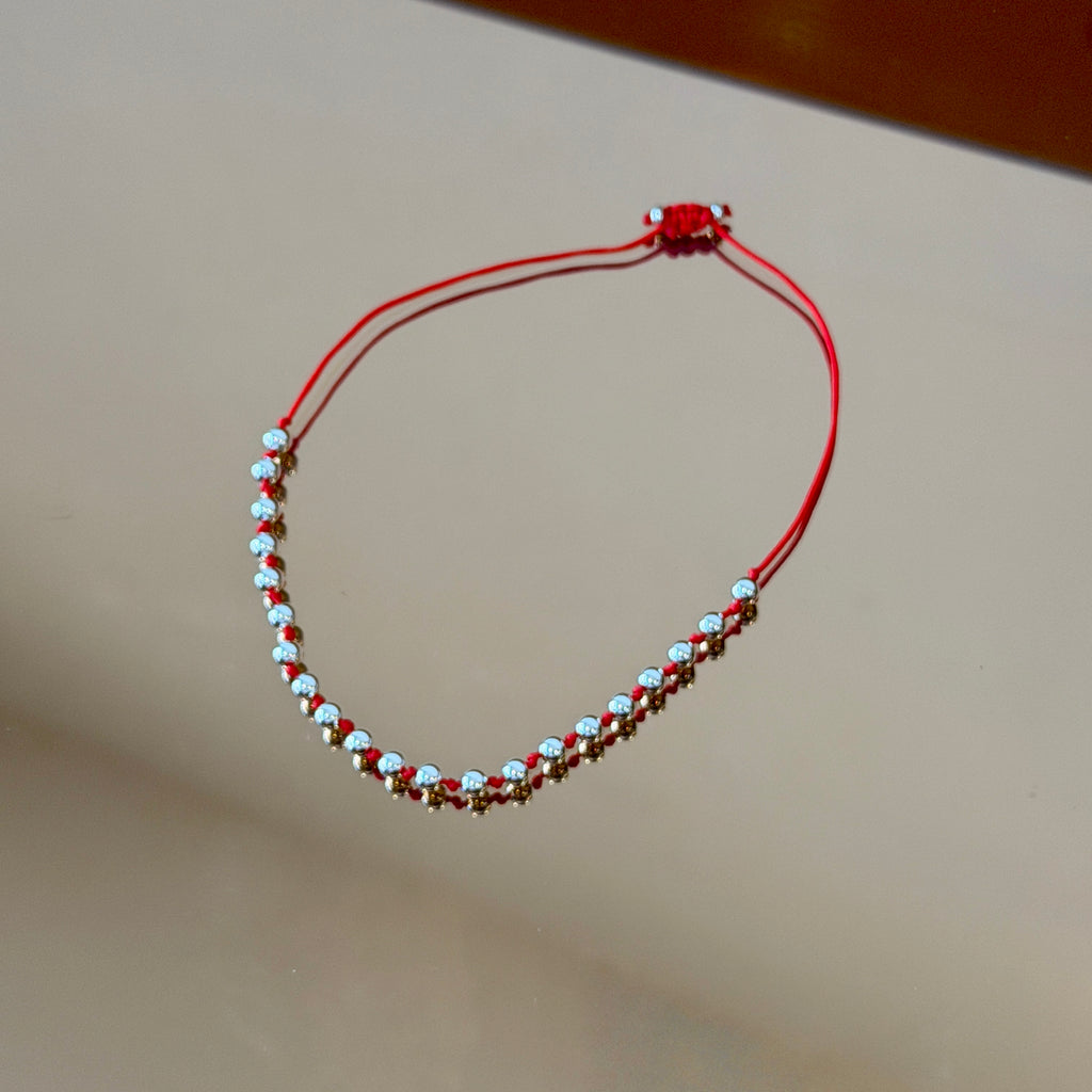 String Bracelet with Silver Accents