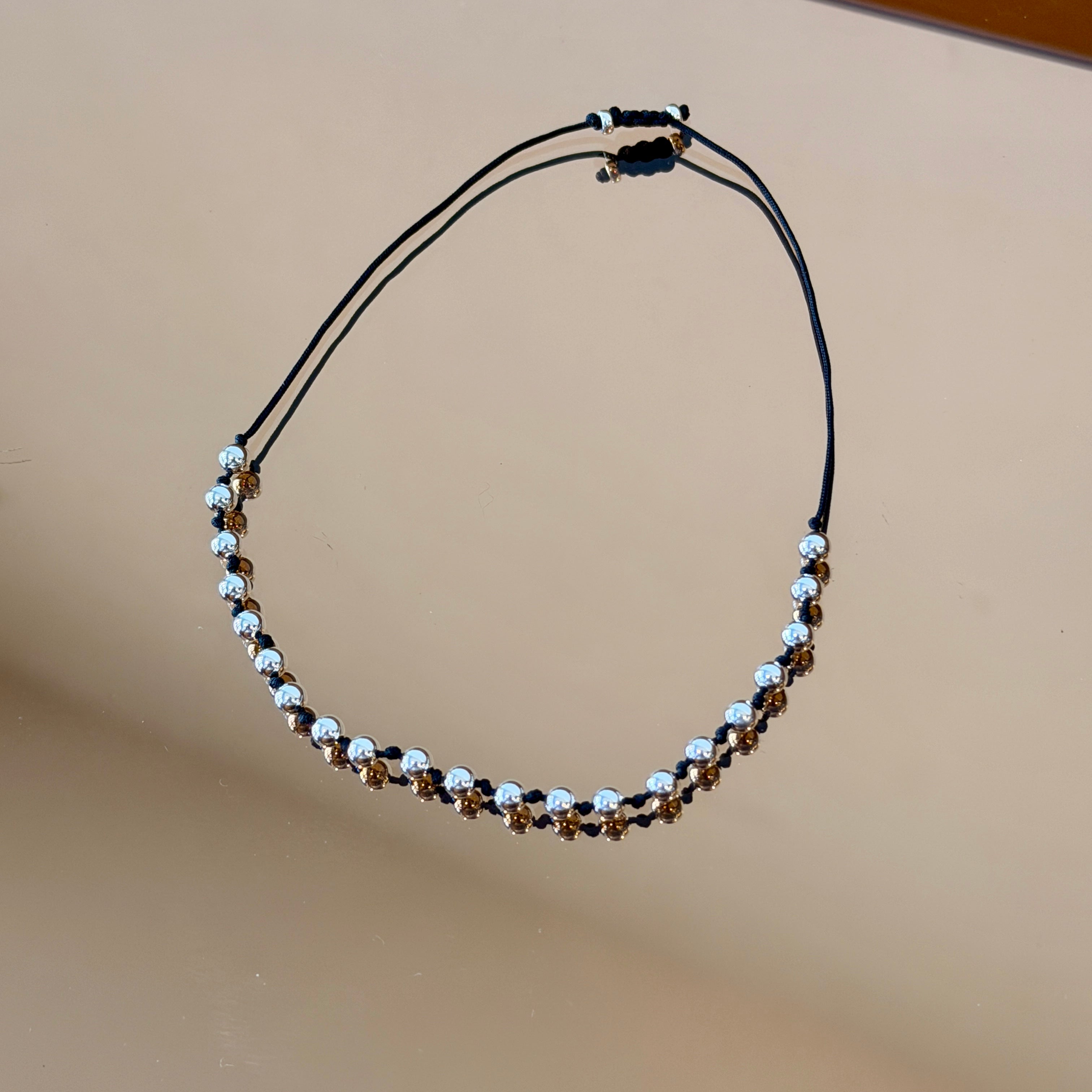String Bracelet with Silver Accents