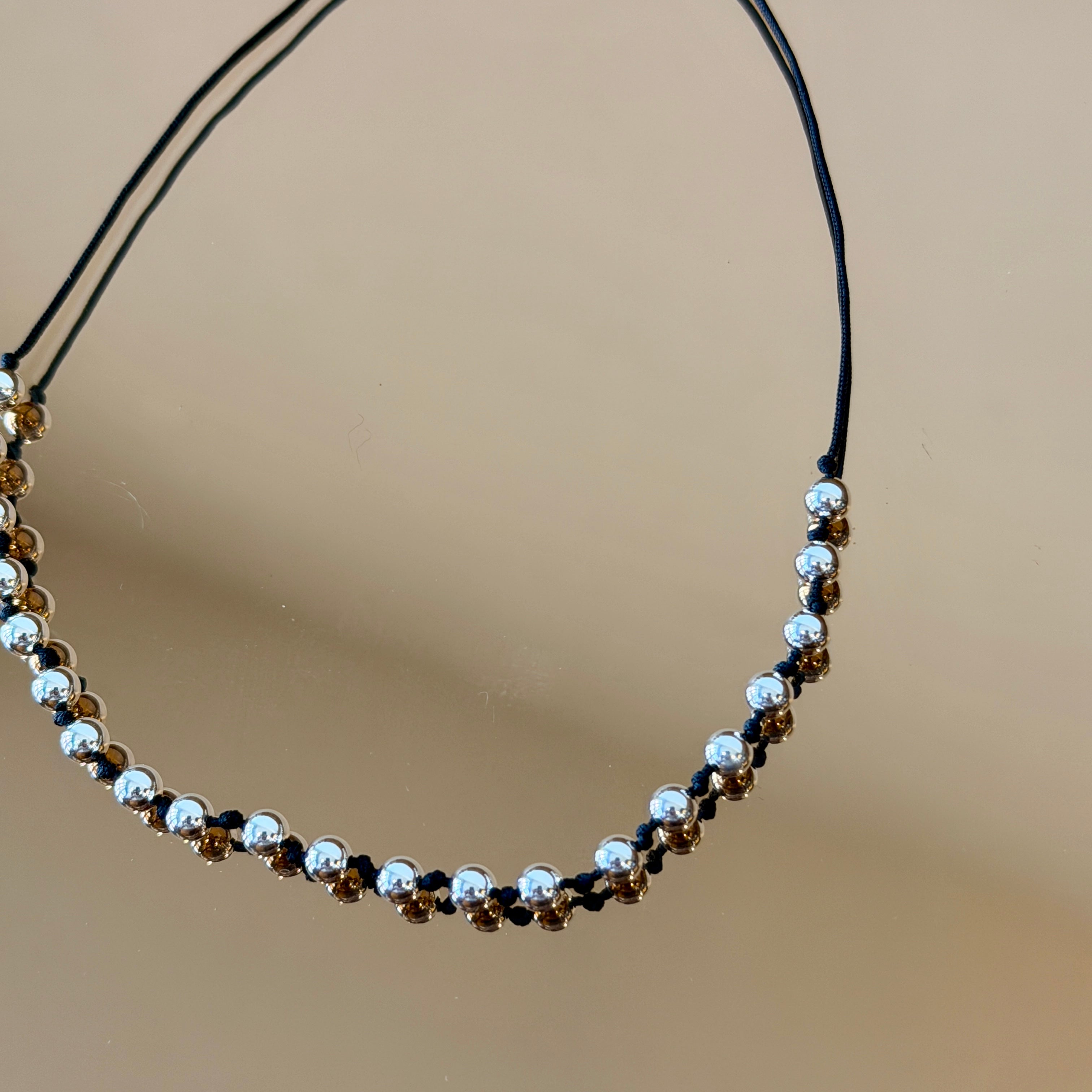 String Bracelet with Silver Accents