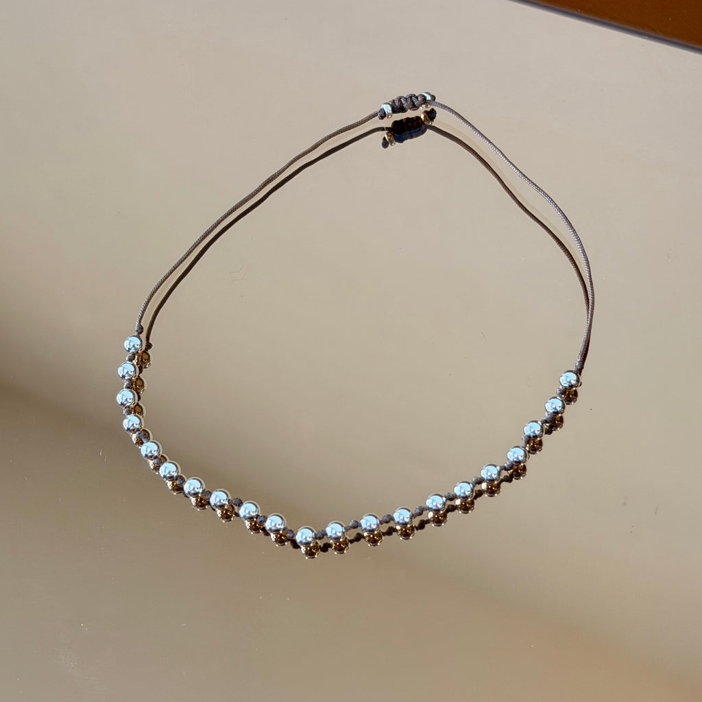String Bracelet with Silver Accents
