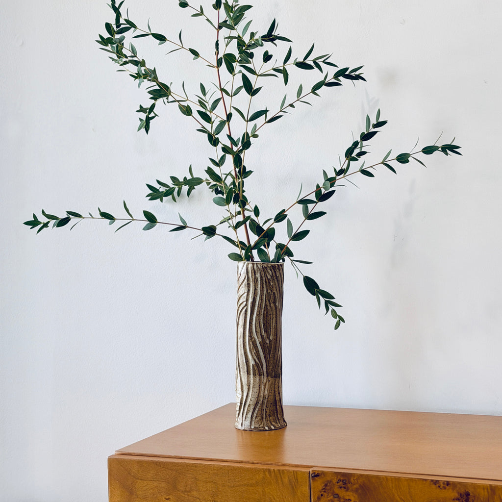Tall Vase with Intricate Carvings