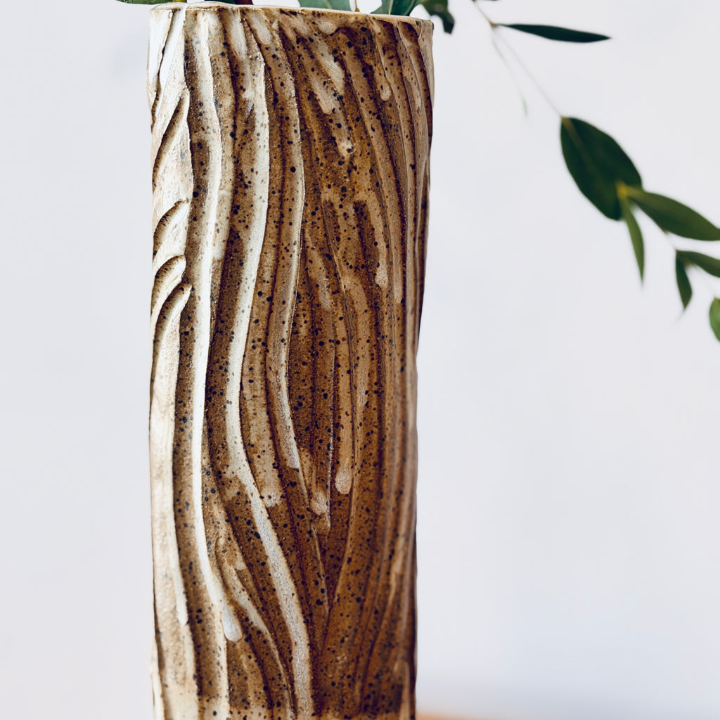 Tall Vase with Intricate Carvings