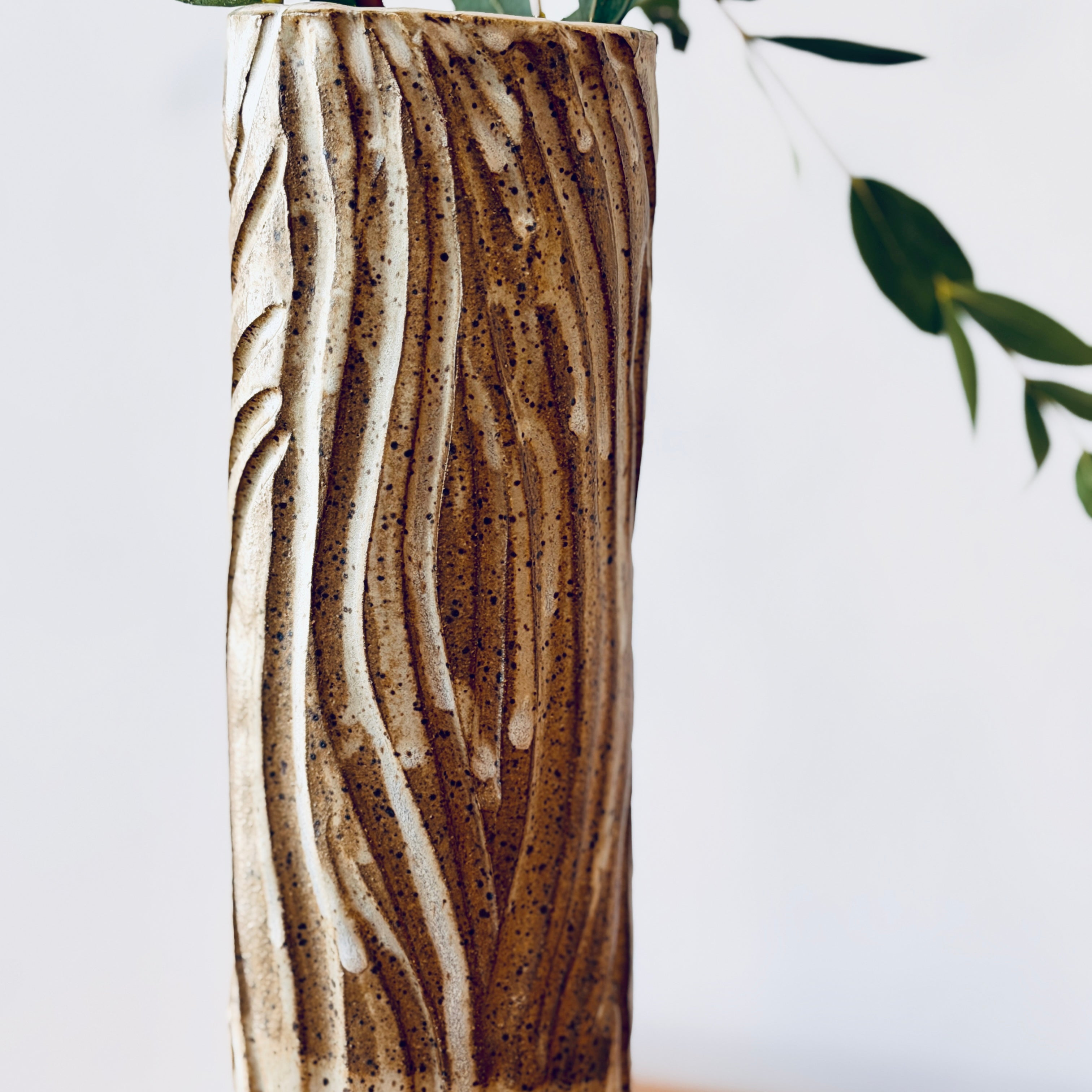 Tall Vase with Intricate Carvings